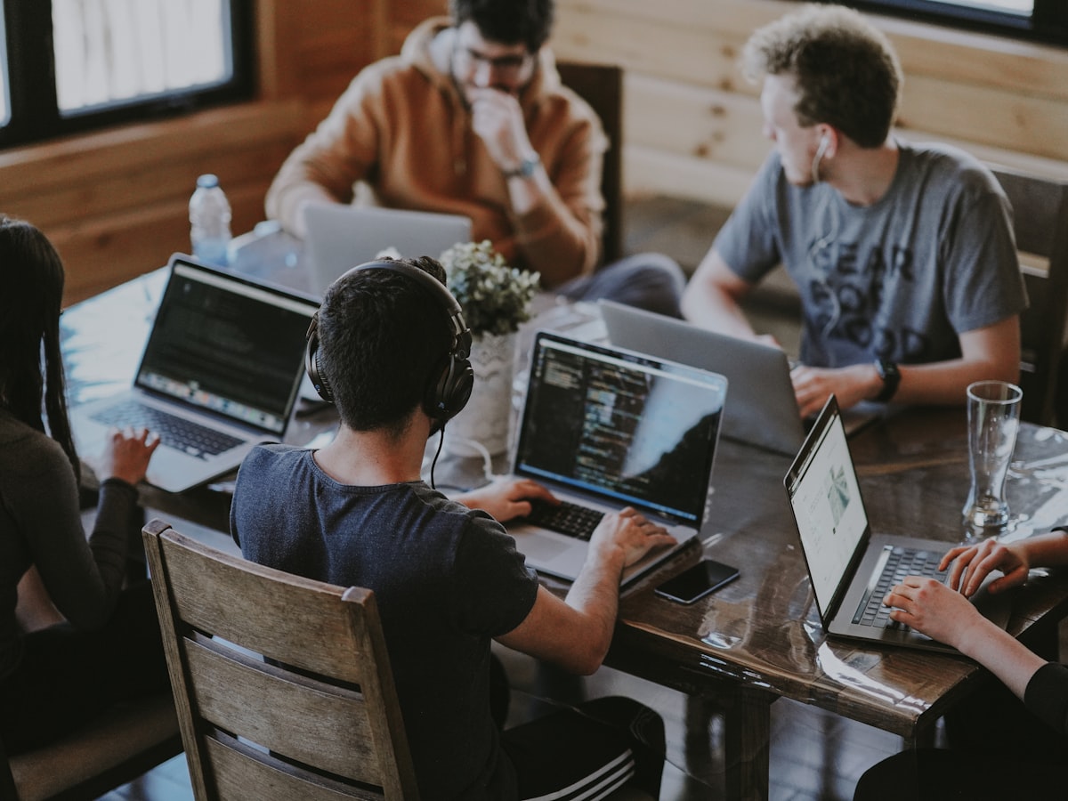 Small business team collaborating with technology